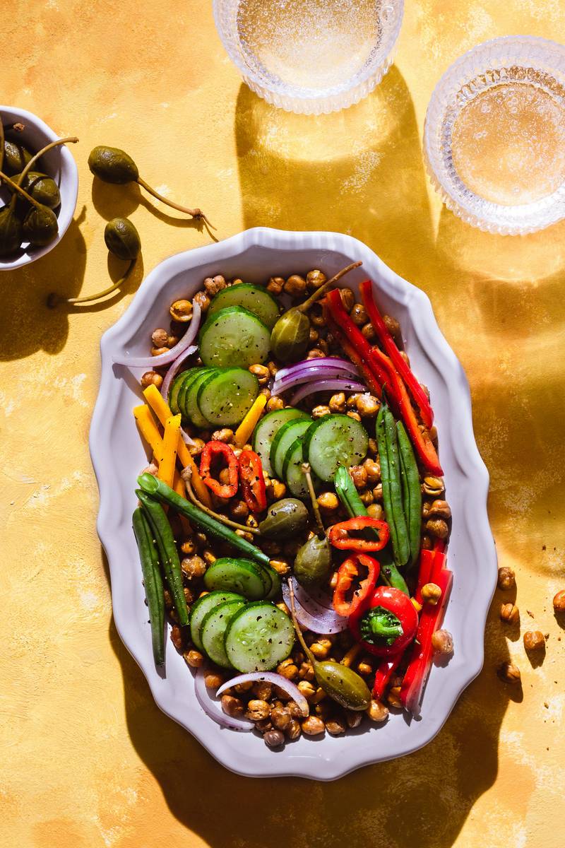 Mastruz em um potinho ao lado de uma receita caseira